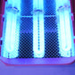 UV nail curing lamp with illuminated tubes inside the curing chamber