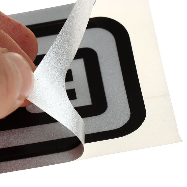 Close-up of BRAZZERS logo car sticker, black letters with yellow accent