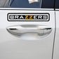 BRAZZERS logo car sticker on white car door panel