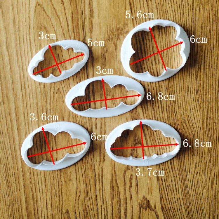 Cloud-shaped fondant mold cutters with size measurements labeled
