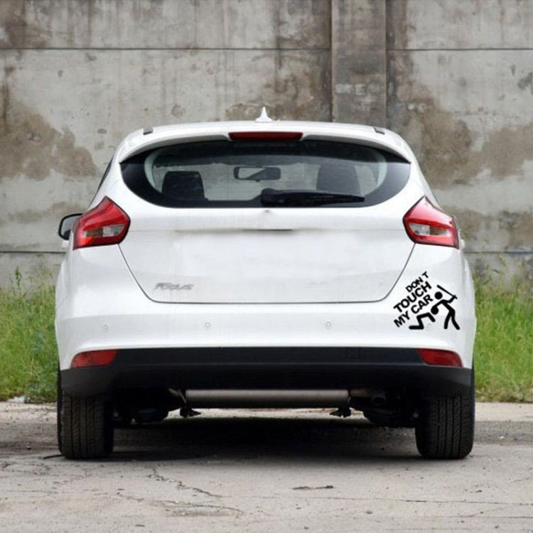 Black "DON'T TOUCH MY CAR" window decal on the rear of a white hatchback.