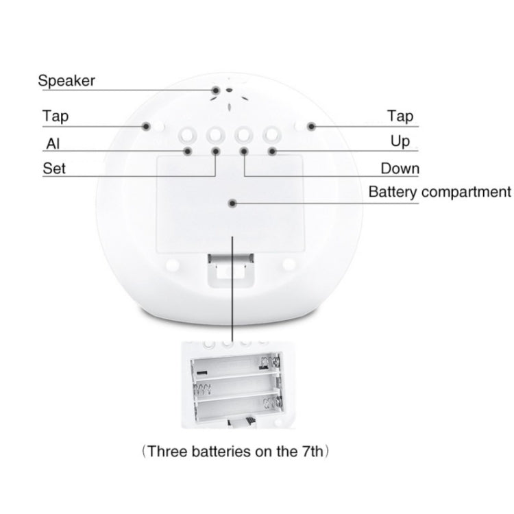Round alarm clock back view with speaker and labeled controls, includes battery compartment