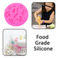 Pink silicone mold with baby hand, foot, and bottle motifs for cake decorating