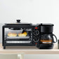 Black mini oven with two bread rolls inside, plus attached coffee maker module