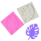 Pink and gray tree leaf molds with embossed leaf vein details