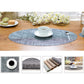 Oval dining table mat placemat on wooden table with cup and matching saucer