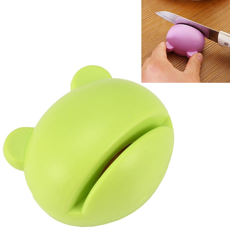 Green cartoon-style handheld knife sharpener with U-shaped slot