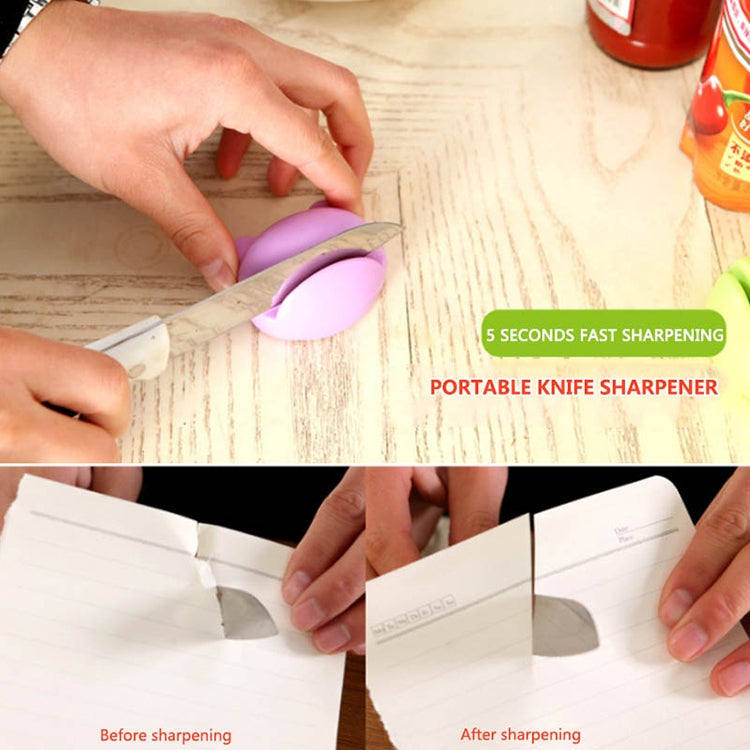 Purple portable knife sharpener held over a kitchen knife for sharpening