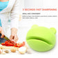 Green cartoon-style knife sharpener with rounded casing and side handle