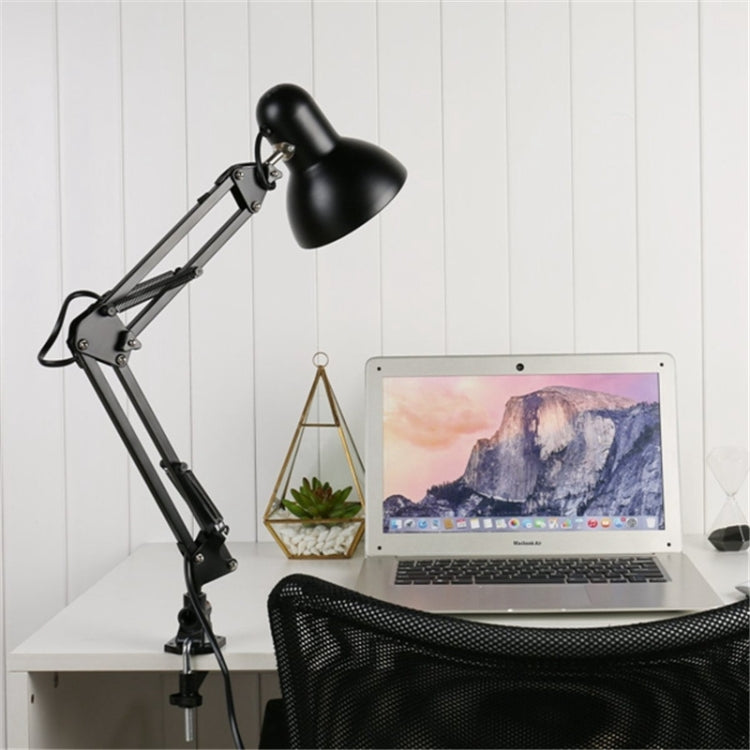 Black clamp-on swing arm desk lamp with round adjustable shade