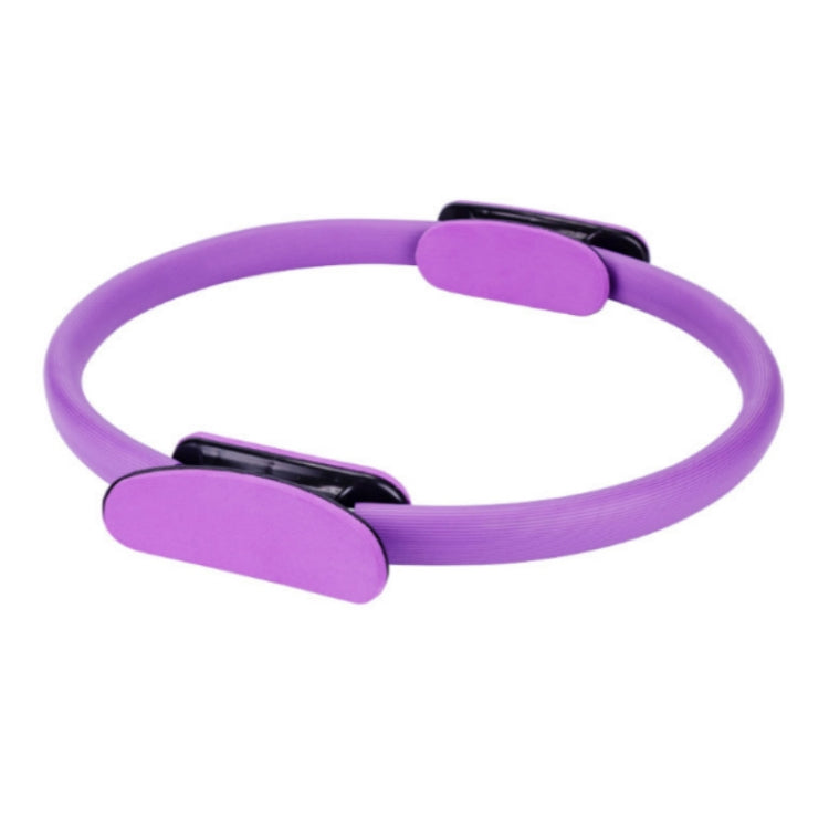 Purple Pilates ring with two foam-covered handles and black resistance bars