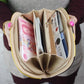 Cream long zipper wallet clutch interior with card slots and document compartments