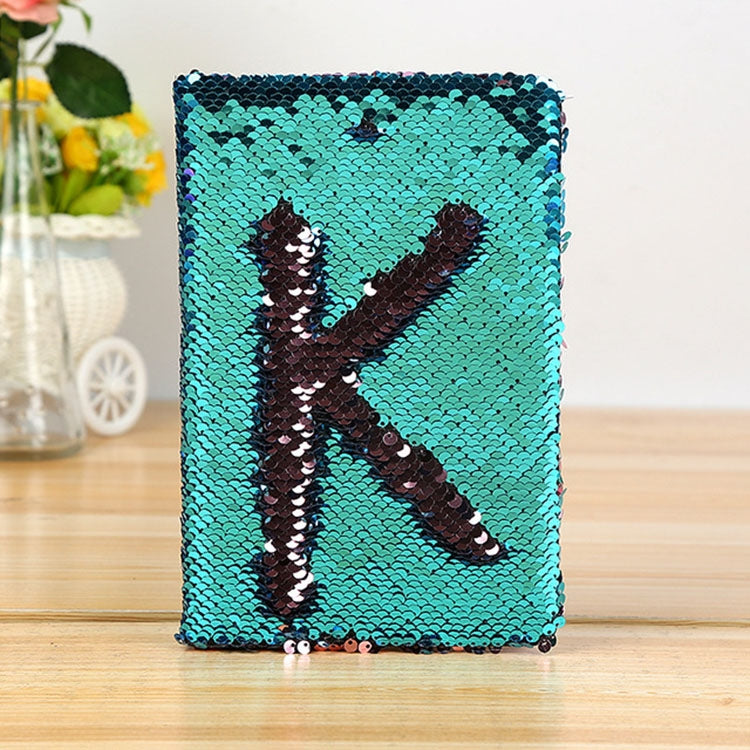 Lake blue sequin flip letter K notebook with dark sequin outline