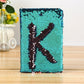 Lake blue sequin flip notebook featuring a dark and silver K letter on cover