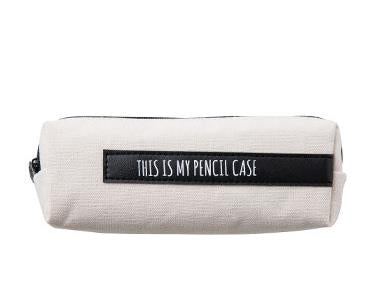 Cream canvas pencil case with black front label and zipper, large rectangular shape