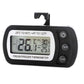 Black digital thermometer showing LCD reading with power and unit toggle buttons