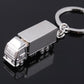 Silver van-shaped metal keychain pendant with chain, left-facing truck detail