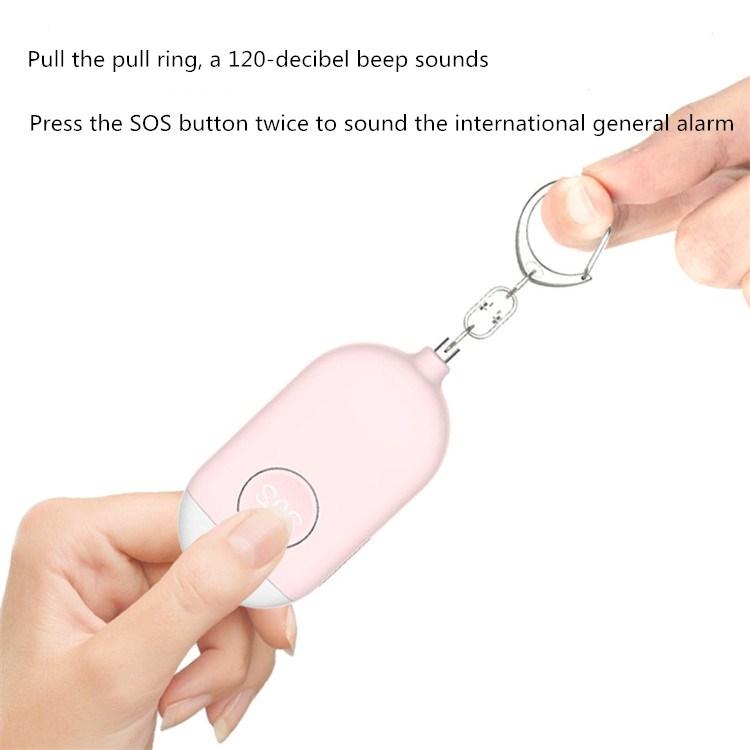 Pink keychain alarm flashlight, hand pulling safety ring above SOS button