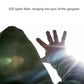 Portable personal alarm flashlight beaming LED light from SOS keychain