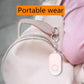 Pink keychain personal alarm flashlight clipped to bag strap