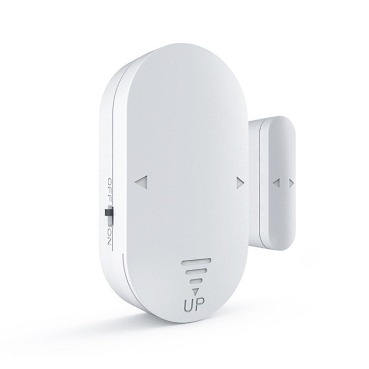 White anti-theft alarm sensor with arrow indicators and UP label, side view