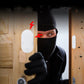 White anti-theft alarm sensor mounted on a door edge, with magnet module
