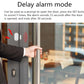 White delay-alarm sensor on a door with magnetic contact indicator