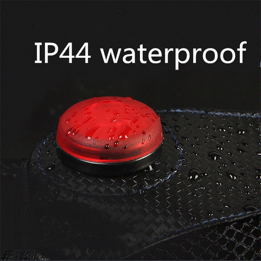 Waterproof bicycle tail bag pocket with red protective cap, textured fabric surface