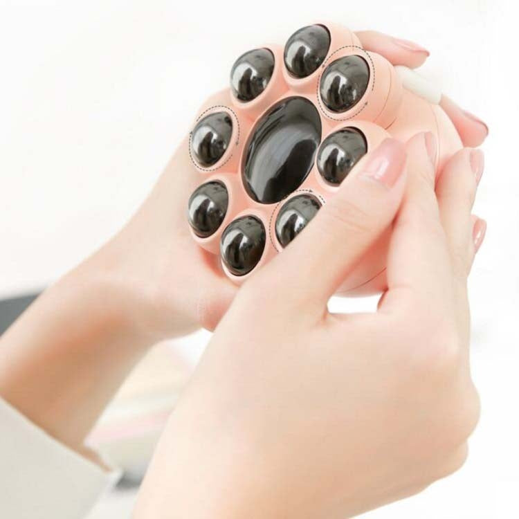 Pink octopus massager underside with multiple black rolling nodes for massage