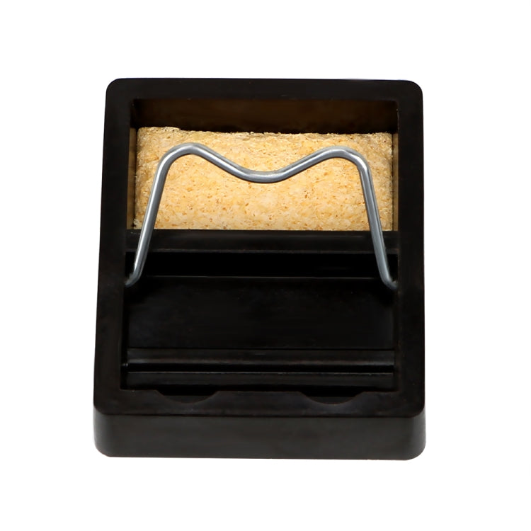 Black square soldering iron stand with two metal rest legs and sponge pad