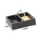 Black square soldering iron stand with metal rest and sponge pad, side view