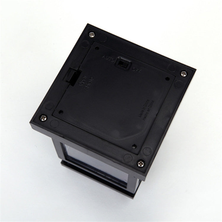 Black lantern base with solar power compartment and USB port on back plate