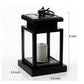 Black lantern-style LED candle light with clear glass panels and mounted frosted candle