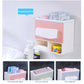 Light blue bathroom napkin holder tray with front tissue bay and lower storage for toiletries