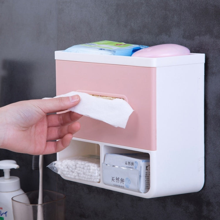 Wall-mounted napkin holder tray in white and pink, tissue paper pulled out