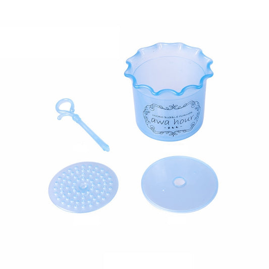 Blue facial cleaner frother bottle with squeeze handle, lid, and foam discs