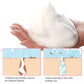 White foam from facial cleaner frother bottle in cupped hands