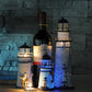 Decorative LED night light towers glowing blue on tabletop