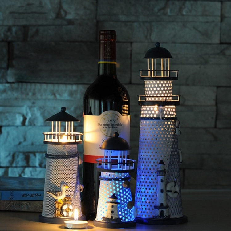 Decorative LED night light towers glowing blue on tabletop