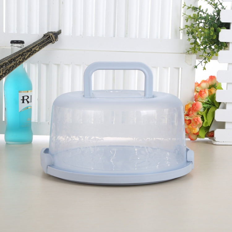 Light blue portable plastic storage/cake box with round handle and domed lid tray.