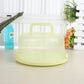 Light green round-handle plastic storage/cake box with domed lid and base tray.