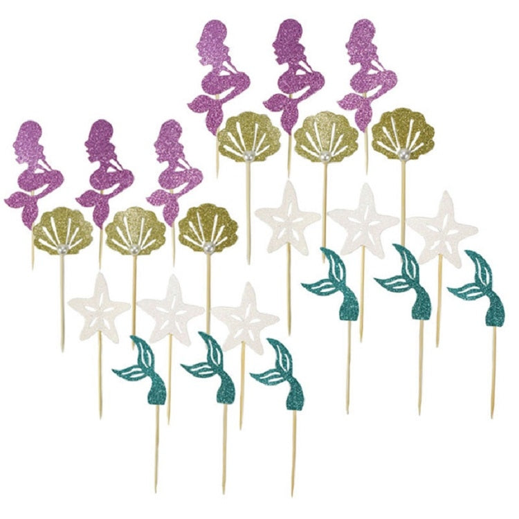 Set of mermaid cupcake toppers: purple figures, teal tails, gold fans, white stars on sticks