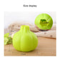 Lime green silicone garlic peeler size view, 7.5cm x 2.5cm.