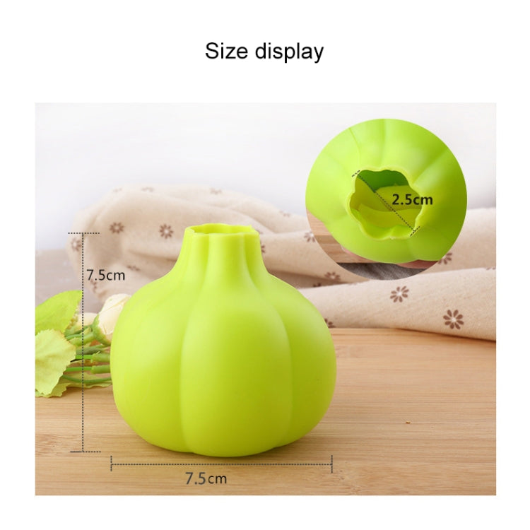 Lime green silicone garlic peeler size view, 7.5cm x 2.5cm.