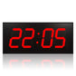 LED digital wall clock with red segmented time display 22:15