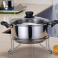 Stainless pot steamer with black lid knob on chrome stand with side handles