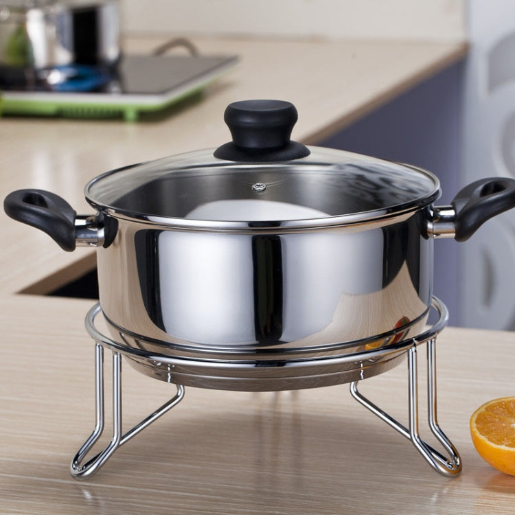 Stainless pot steamer with black lid knob on chrome stand with side handles