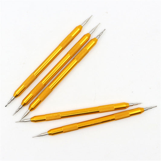 Gold watch repair tools with pointed ends and needle tips for strap link removal