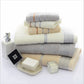 Cotton towel bath set with light beige and gray towels, Greek pattern border, stripe band