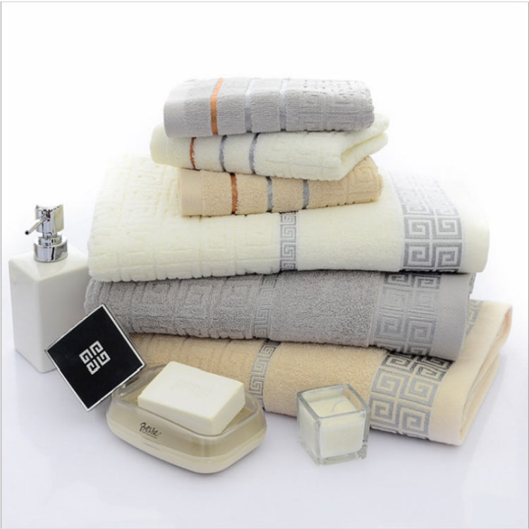 Cotton towel bath set with light beige and gray towels, Greek pattern border, stripe band